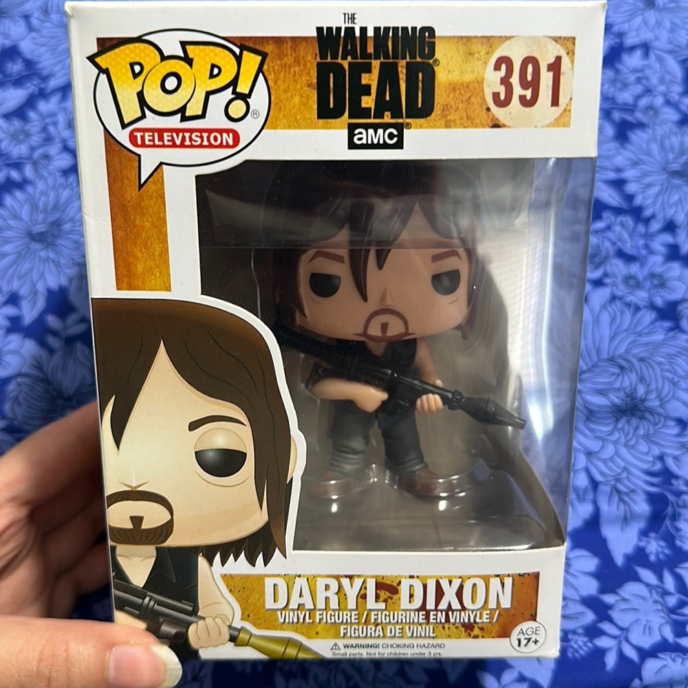 Funko Pop Daryl Dixon from "The Walking Dead" available in unopened box.
